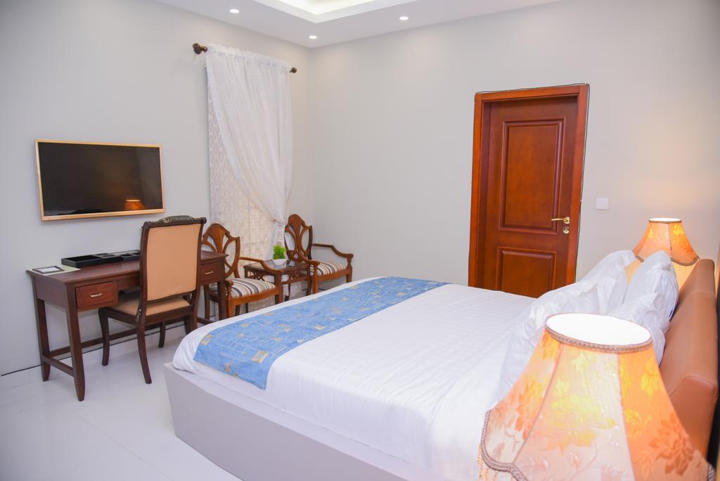 Orchards Cottage Hotel Karachi Bagian luar foto