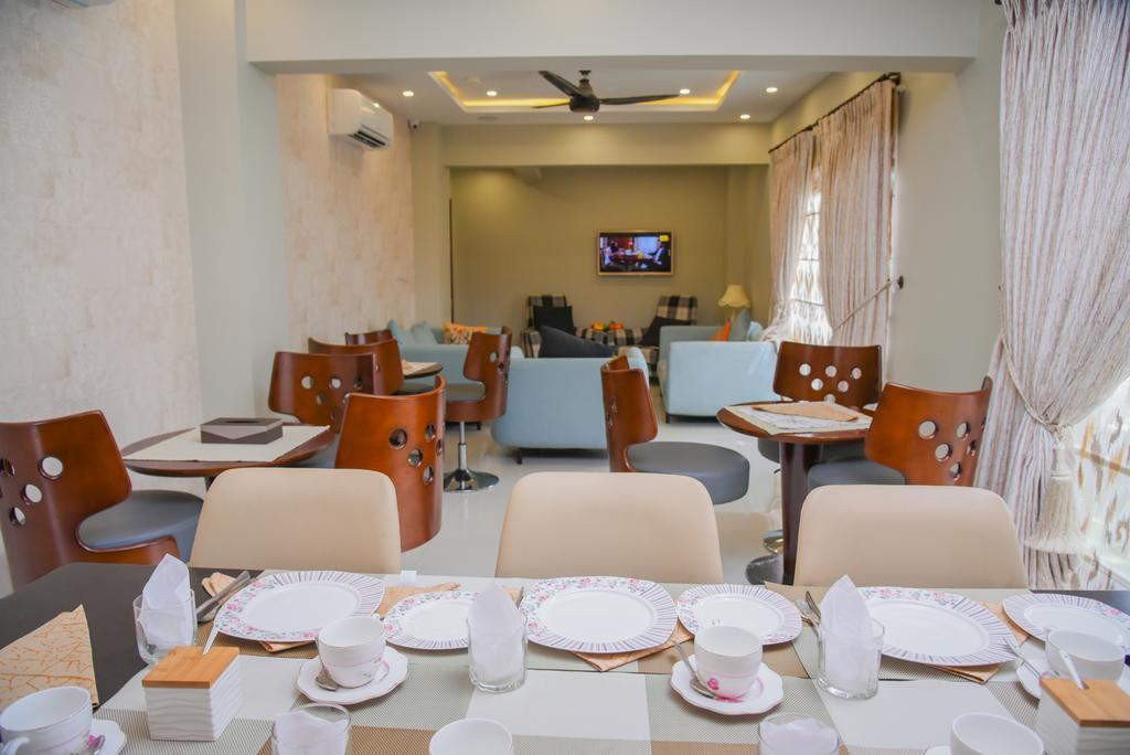 Orchards Cottage Hotel Karachi Bagian luar foto