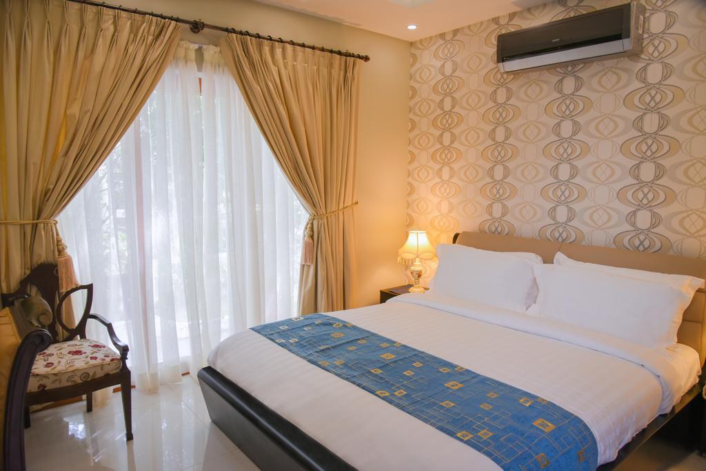 Orchards Cottage Hotel Karachi Bagian luar foto